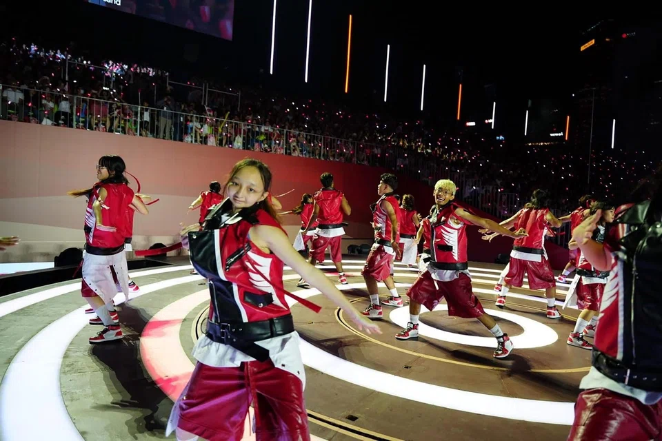 Student Sara Grace Kueh, 17 (foreground), is a four-cancer survivor. Despite having had lung surgery to remove a tumour in March, she will be performing at the National Day Parade this year. Copyright: Sara Grace Kueh