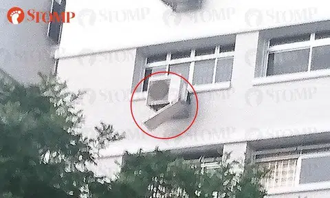 Pasir Ris resident worried about metal casing hanging from 10th storey aircon compressor