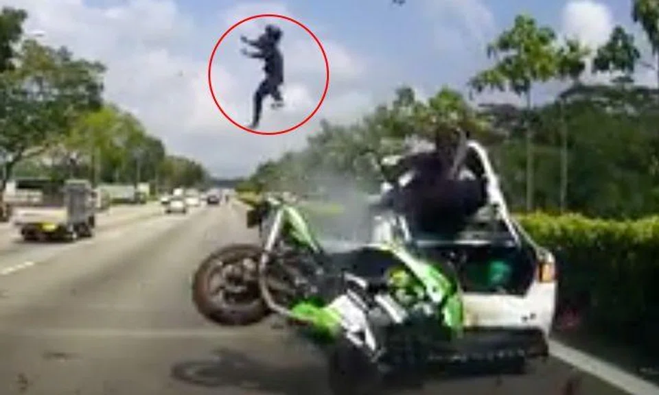 Pillion rider flung from bike after motorcyclist crashes into stationary car along SLE 