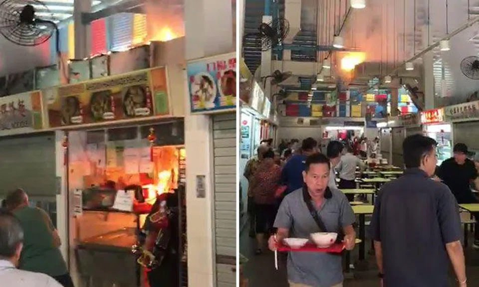 Overheating wok causes fire at Telok Blangah hawker centre, 12 stalls affected