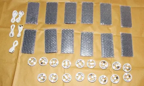 Several mobile phones and accessories that were purportedly counterfeit, fake invoices and cash amounting to about $1,440 were seized.