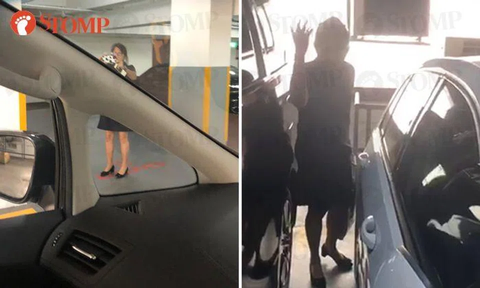 Woman points middle finger, hurls vulgarities during parking space dispute at Liat Towers