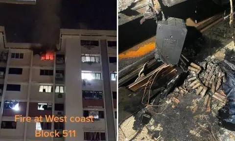 A video of flames and smoke from a window in a residential unit on the top floor of the block was posted online.