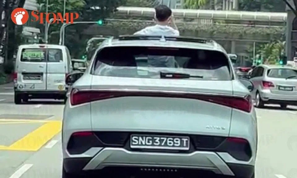 By standing in the BYD Atto electric SUV with his body sticking out of the sunroof, the boy in the video is clearly not wearing a seatbelt.