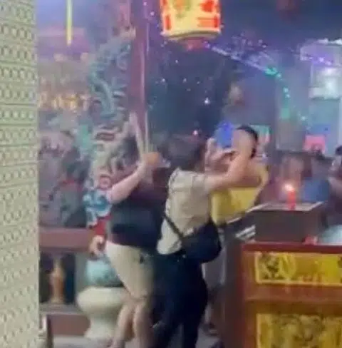 The three devotees who allegedly attacked a volunteer have offered to apologise in a newspaper.