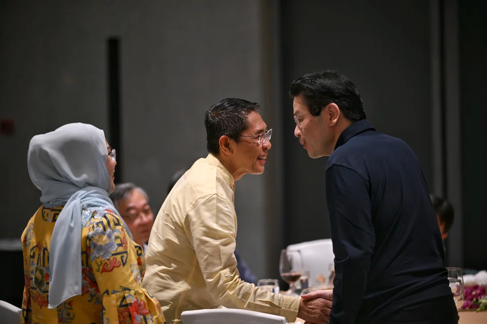 Seven retired MPs entered politics in the 2001 and 2006 elections, one of whom is Dr Maliki Osman (centre).