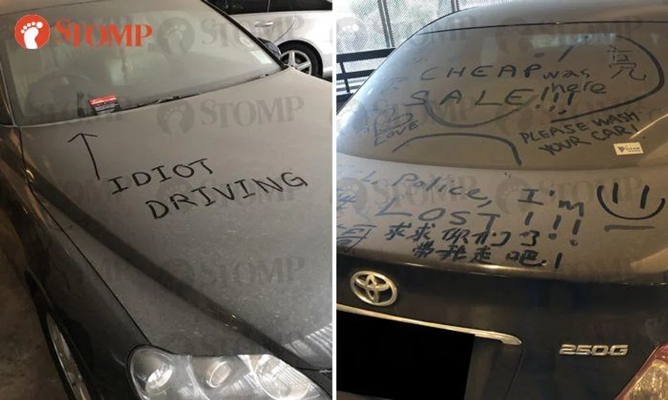 Abandoned car at International Plaza attracts dust -- and vandals