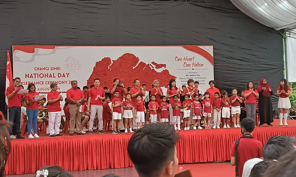 The National Day Observance Ceremony for Ms Tan’s Changi Simei ward was held from 8.30am to 11.30am in an open field next to Eastpoint Mall, and included games and band performances. Photo: Facebook/Tay Yong Hong 