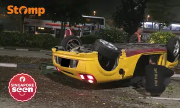 Yellow sports car overturns after Woodlands accident