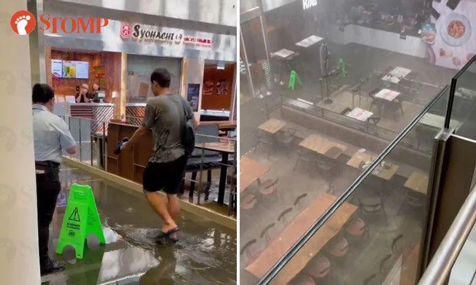 Shoppers drenched after fire sprinklers activated at One Raffles Place