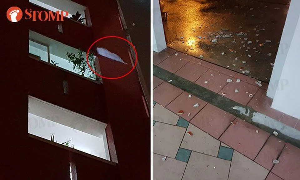 Tiles dislodged from 5th-floor wall at Hougang HDB block during heavy rain
