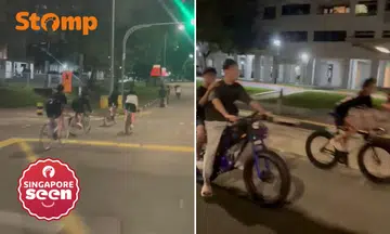 Youths riding e-bikes and bicycles without helmets in Jurong West