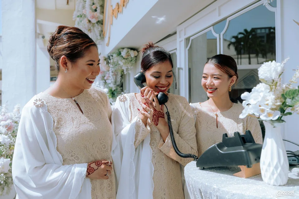 Guests using a video guest book by Teletales. 