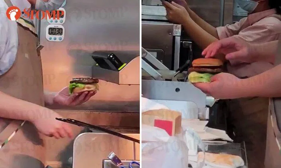 Mos Burger staff given warning, sent for refresher training after handling customer's food with bare hands