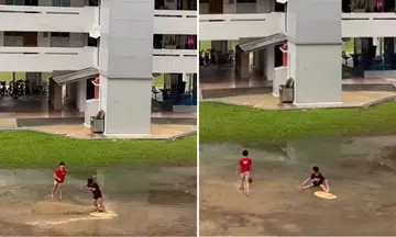 Boys 'surfing' on puddle at HDB grass patch ignites wave of nostalgia: 'This is what childhood is about'