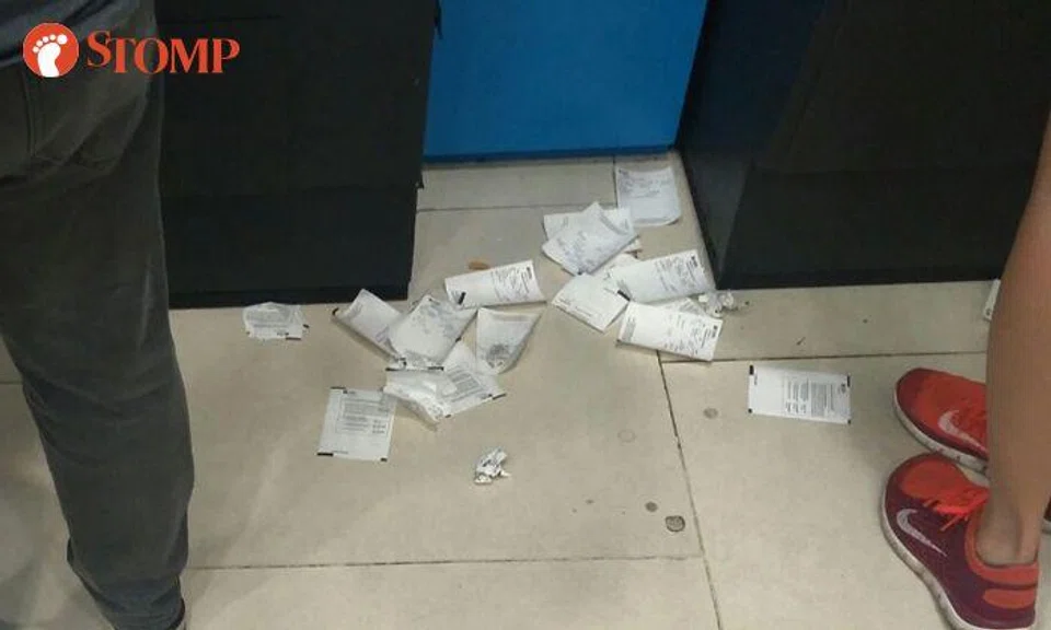 Why so inconsiderate? Receipts found strewn all over the floor at Woodlands MRT station