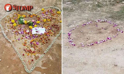 Flowers placed in tribute for TP officer who died in the line of duty at Serangoon Rd accident site