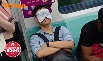 Handkerchief as eye mask on MRT train