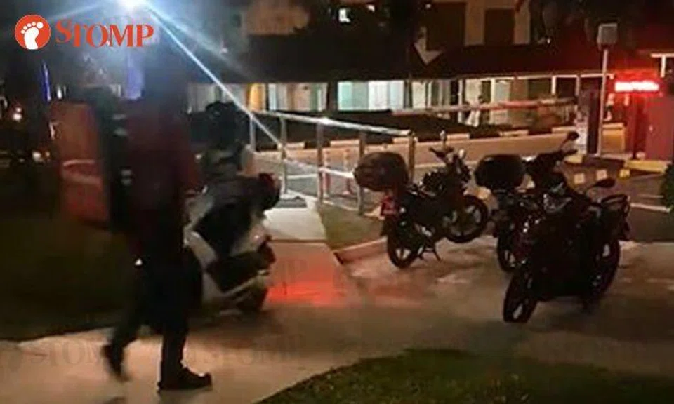 A biker has been spotted riding on a pedestrian walkway just to avoid paying parking fees at a carpark gantry in Tampines