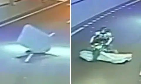 A mattress came flying at him -- but watch how this Aussie biker deals with it like a boss