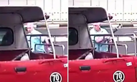 Pedestrian whacks lorry with his umbrella after driver almost hits him at Grange Road junction