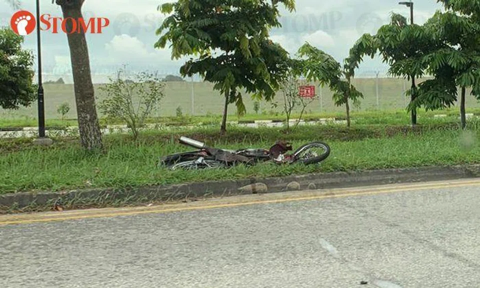 Motorcyclist taken to hospital after accident with tipper truck and van at Seletar West Link