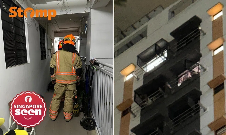 man sitting on window ledge at teck whye crescent