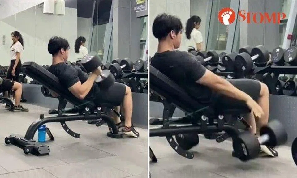 The video shows the man seated on a bench doing a set of incline dumbbell press before lowering his arms to the side and letting go the dumbbells which fell on the floor so hard they bounced several times.