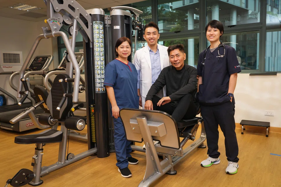 (From left) TTSH nurse clinician Tham Lai Mei, TTSH senior physiotherapist Keith Chua, Mr Tan Kim Kiang and Dr Violet Hoon, head of cardiac rehabilitation services, at the Cardiac Rehab Gym in Tan Tock Seng Hospital on March 24.