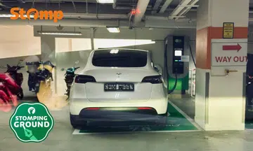 Electric vehicle occupying a charging lot at Hougang Mall