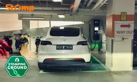 Electric vehicle occupying a charging lot at Hougang Mall