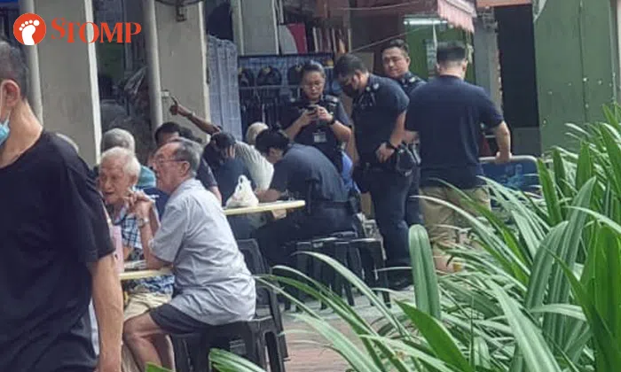 Man, 73, arrested after taking knife from coffee shop stall during ...