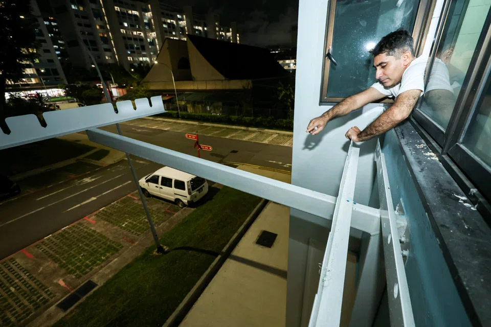 Mr Asif explaining how he leapt from a second-floor window as smoke engulfed his flat.
