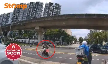 Man riding PMD with boy crosses against red light, Stomper says this is why youths ignore rules