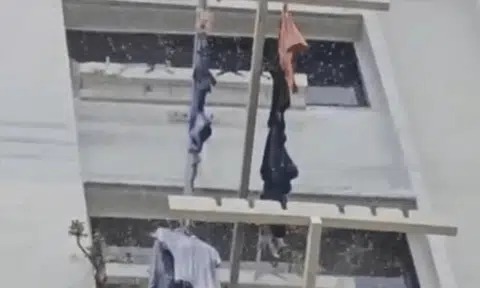 'Spectacular' sight as rooftop tank leak drenches laundry at Yishun block
