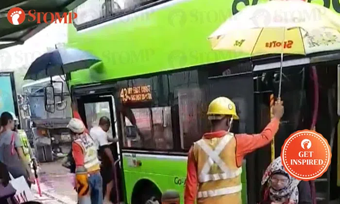 Shield From Bus Foreign workers sacrifice break time to shield bus commuters from the ...