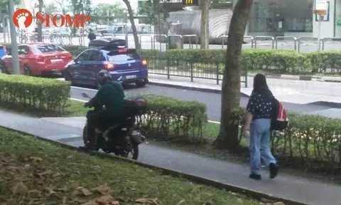 A motorcyclist was seen on the pavement where pedestrians were walking near Block 180 Lompang Road in Bukit Panjang on Sept 30.