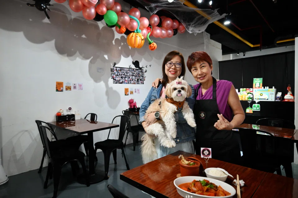 Ms Val Lim runs the pet-friendly Cafe Blossom with her mother May Toh.