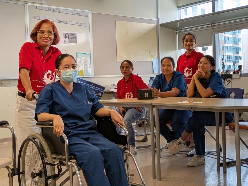 Ms Mary Roja (left) is one of many domestic workers who have spent over a decade volunteering in Singapore.