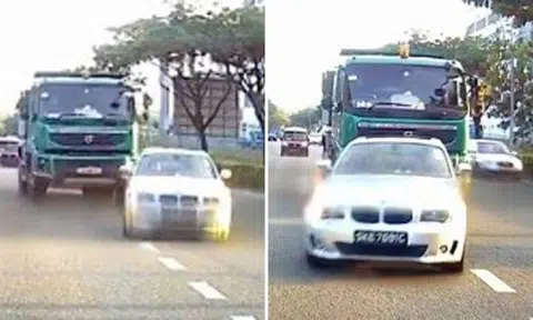 BMW and tipper truck drivers change lanes at the same time on KPE -- and slam right into each other