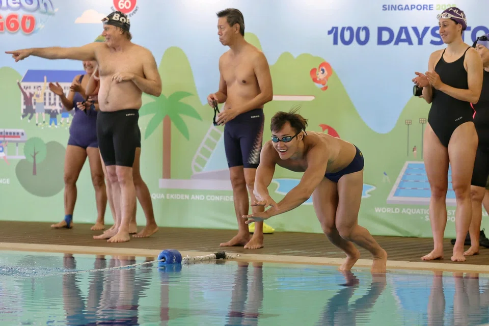 National swimmer Teong Tzen Wei (diving into the pool) said there is no need to feel pressure as he prepares for the World Aquatics Championships in July.