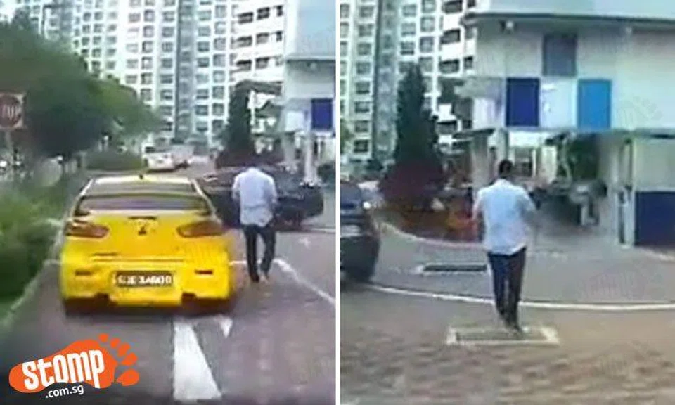 Driver stops car on road, blocks traffic and goes for leisurely stroll at Senja Rd