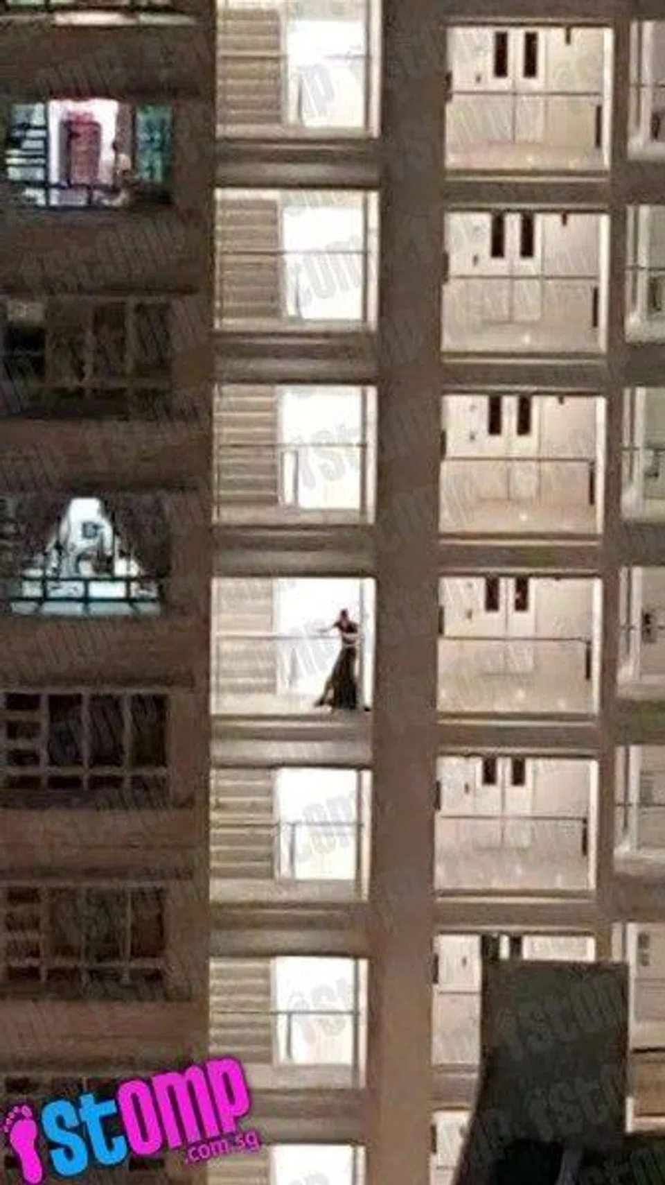 Couple engages in PDA at Sembawang HDB flat -- then hit 'second base' at staircase