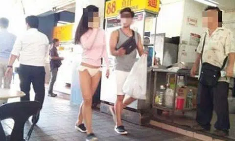 Woman walking around in bikini bottoms gets tongues wagging in Sabah