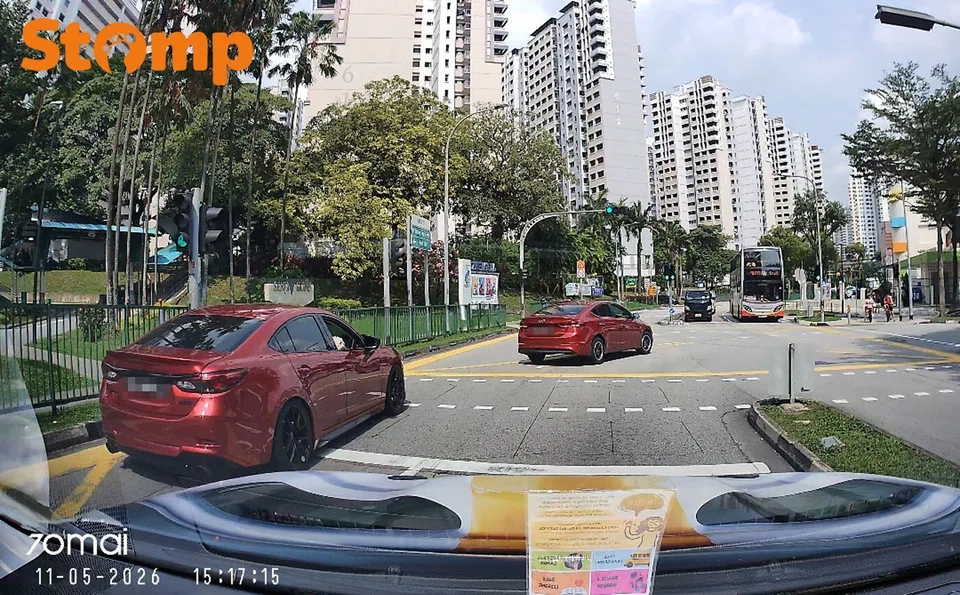 Dog in front seat at Senja Road