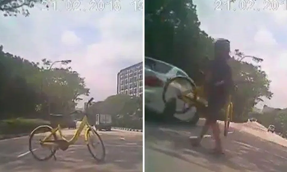 Kudos to motorcyclist for stopping to move ofo bike left in middle of road