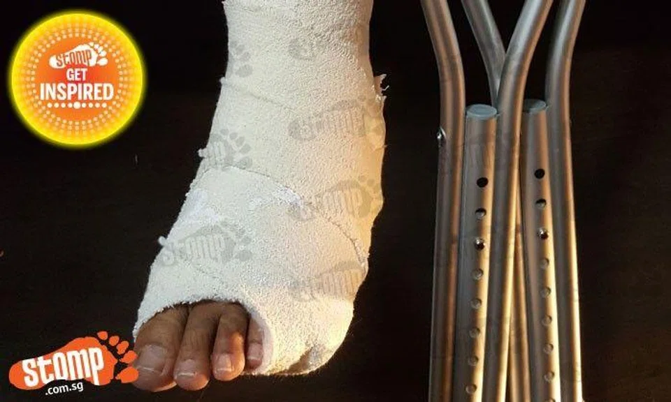 Woman trips on uneven platform in cafe at Esplanade -- but customers help her up and offer ointment