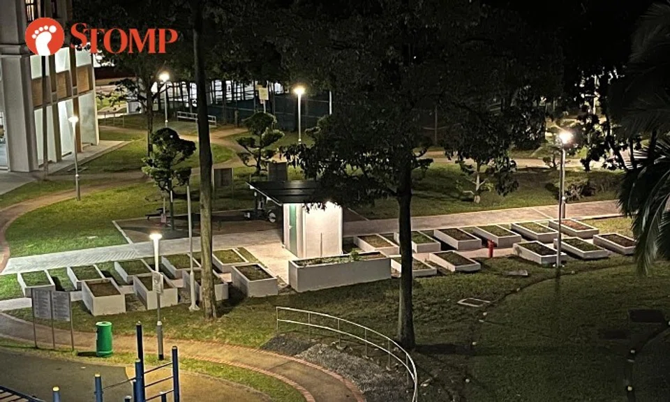 A newly-completed community garden in Yew Tee has sparked debate, with some residents saying its symmetrical planting plots resemble a cemetery. Photo: Stomp