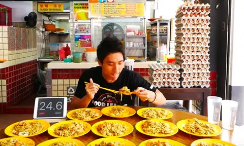 S'pore man does it again by slurping down 13 plates of hokkien mee in under 20 min