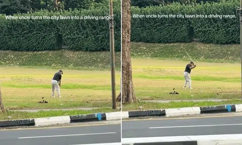 A man practices his swings in an empty field near Orchard Boulevard.